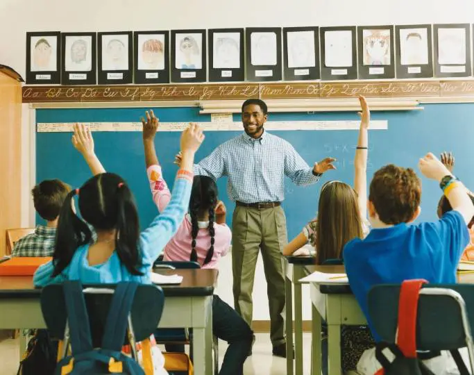 A teacher is giving a class to students.